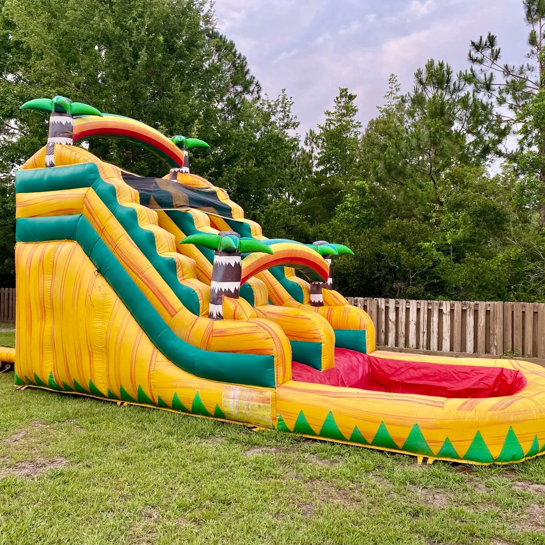 Sunshine Falls 16-ft water slide rental from Bounce Brunswick, great for summer fun in Brunswick GA.