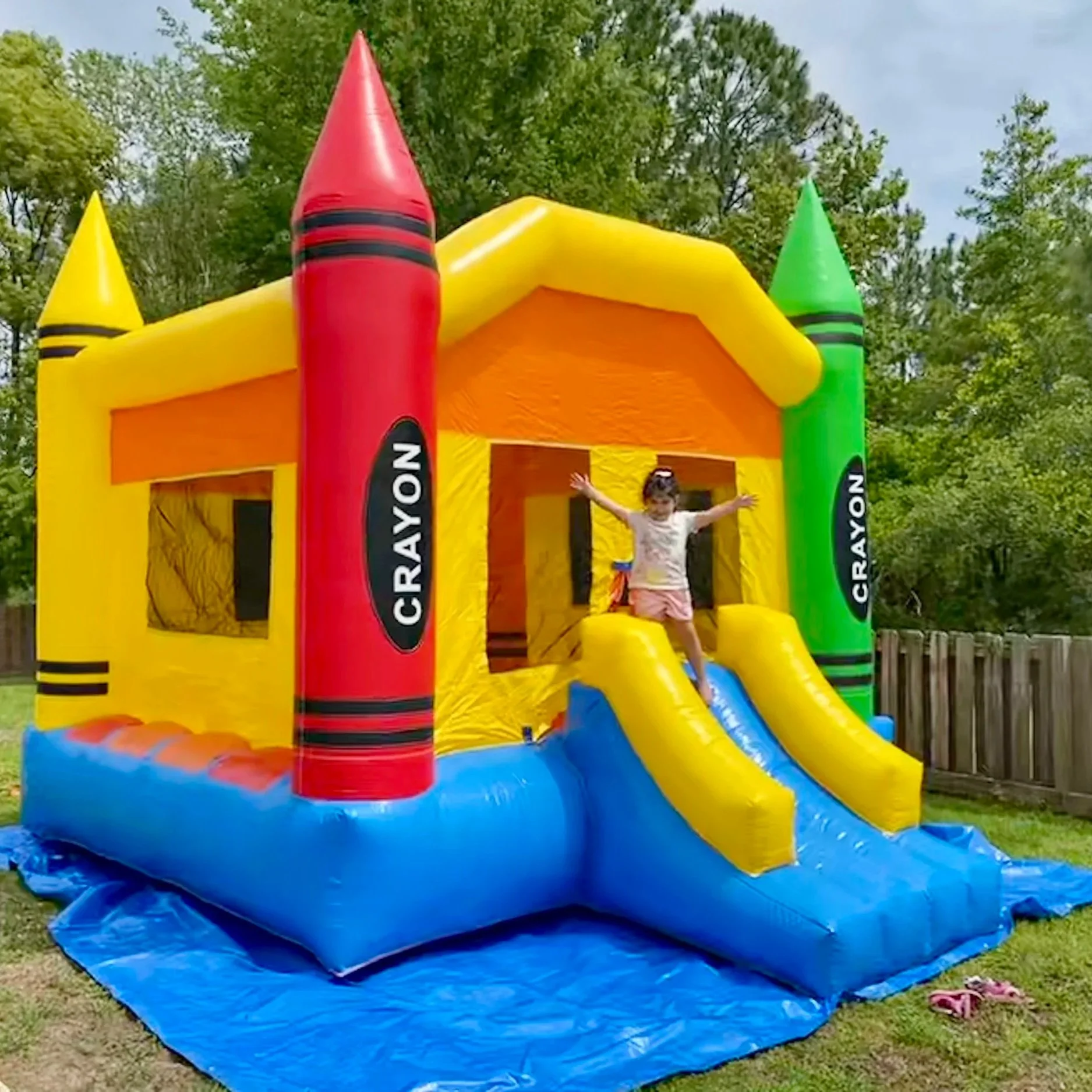 Crayon Castle bounce house set up for a toddler birthday party in Brunswick, GA.