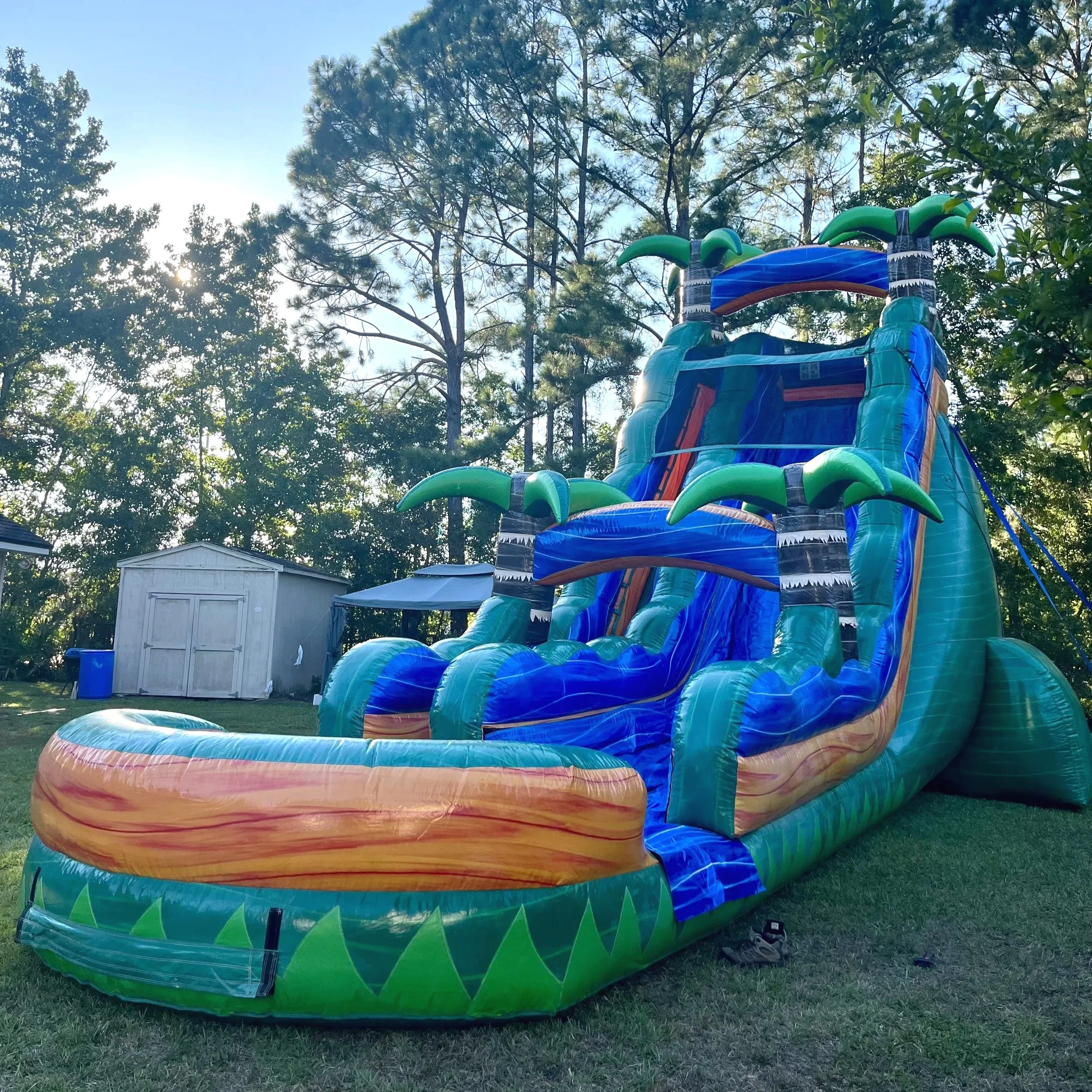 Large 22-foot inflatable water slide rental with splash landing, perfect for kids, teens, and adults in Brunswick GA.