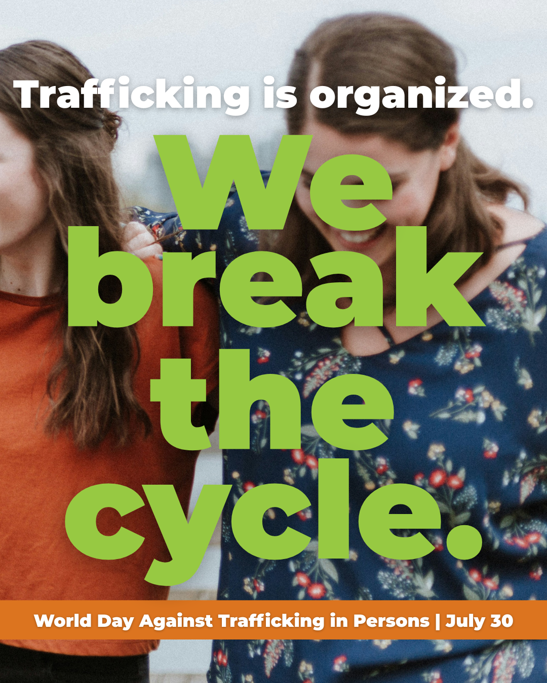 Two women smiling and embracing, with text overlay that reads 'Trafficking is organized. We break the cycle. World Day Against Trafficking in Persons | July 30'.