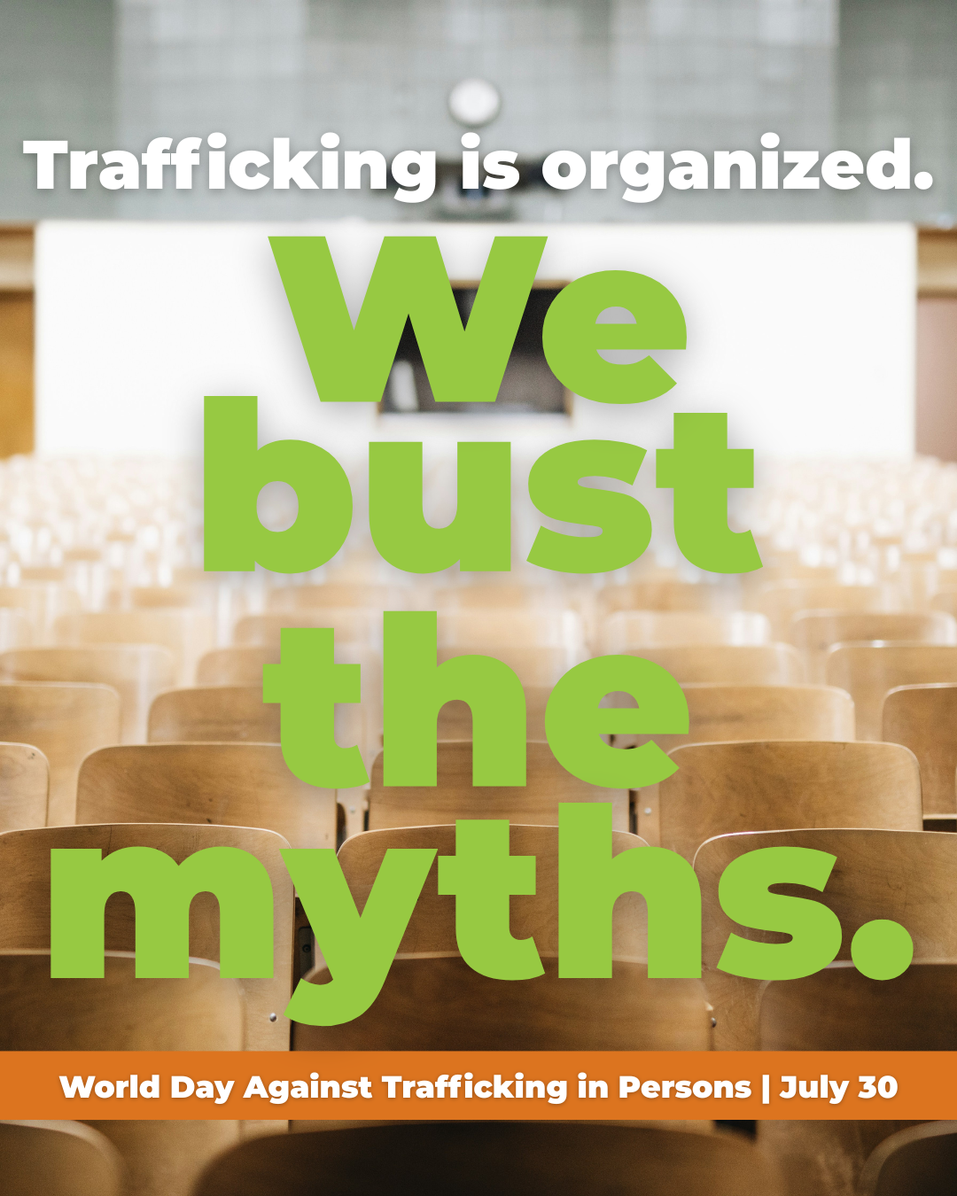 Empty classroom or auditorium with wooden chairs and a stage or presentation area at the front. Overlaid text reads 'Trafficking is organized. We bust the myths. World Day Against Trafficking in Persons | July 30'.