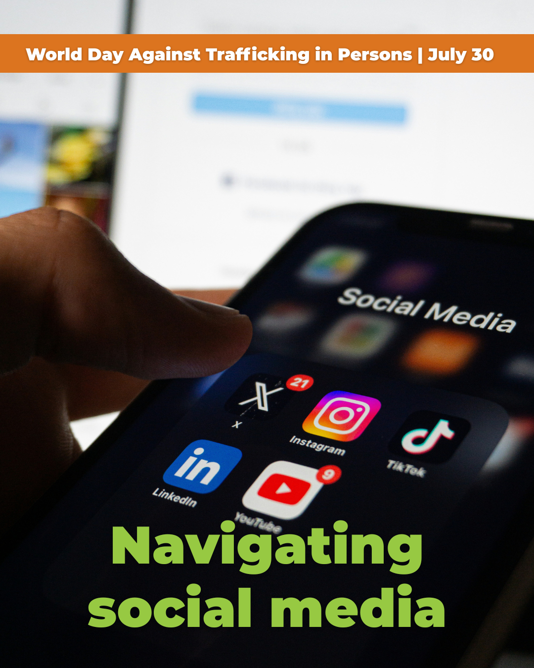 Close-up of a hand holding a smartphone with social media app icons on the screen, including Instagram, TikTok, LinkedIn, and YouTube. The background features a computer screen with a banner reading 'World Day Against Trafficking in Persons | July 30'. Overlaid text says 'Navigating social media' in bright green.
