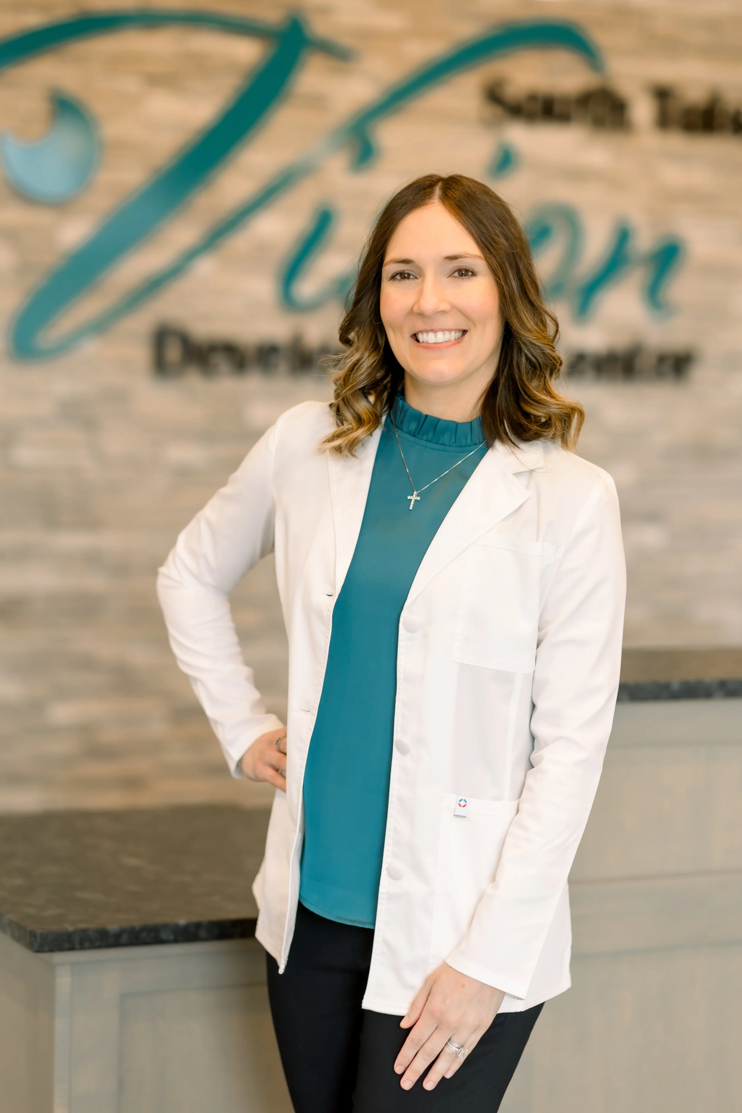Dr. Megan Schmoker, posing for photo in the Tulsa office