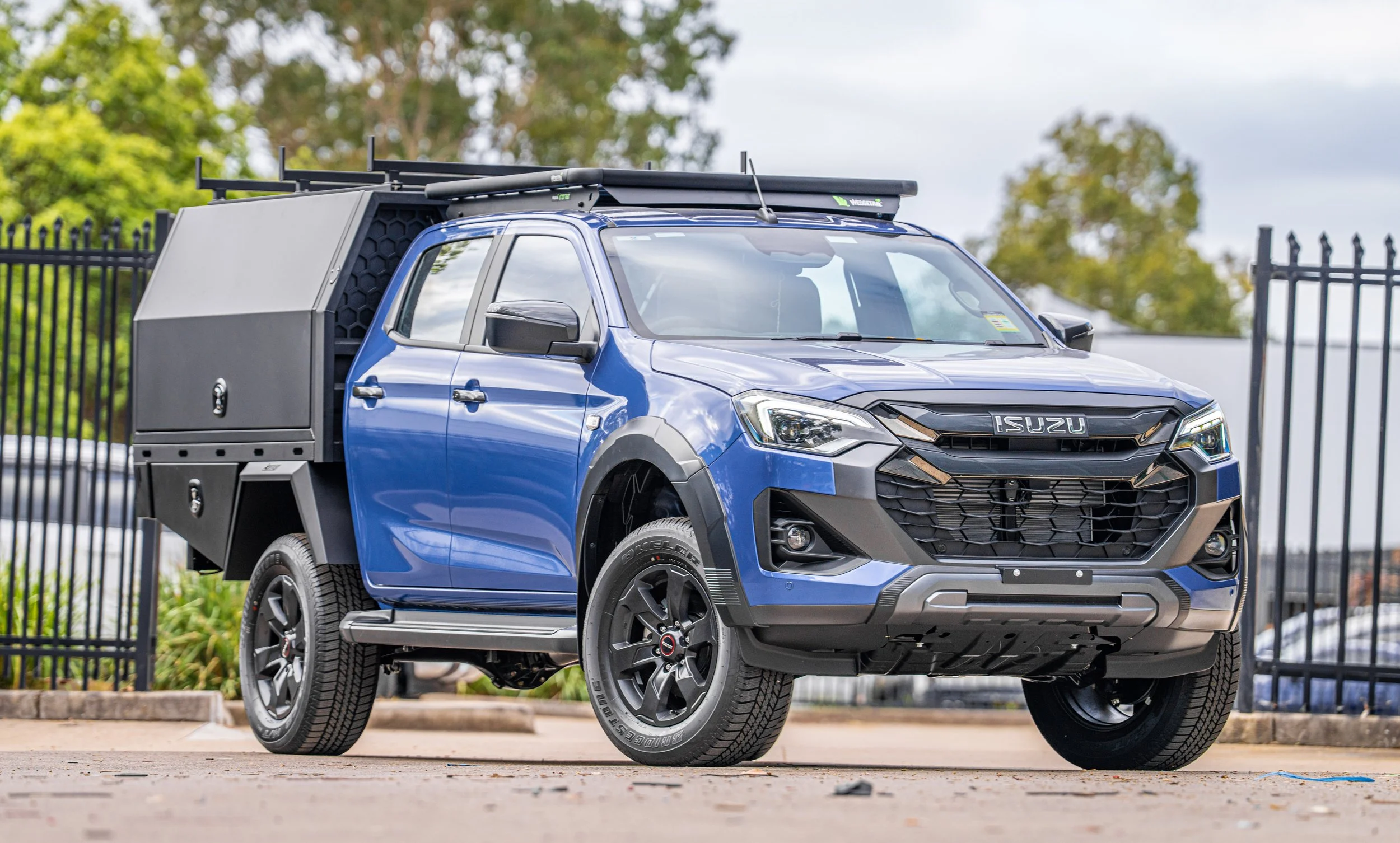 blue Dmax with a trade focused tray and toolbox fitout 