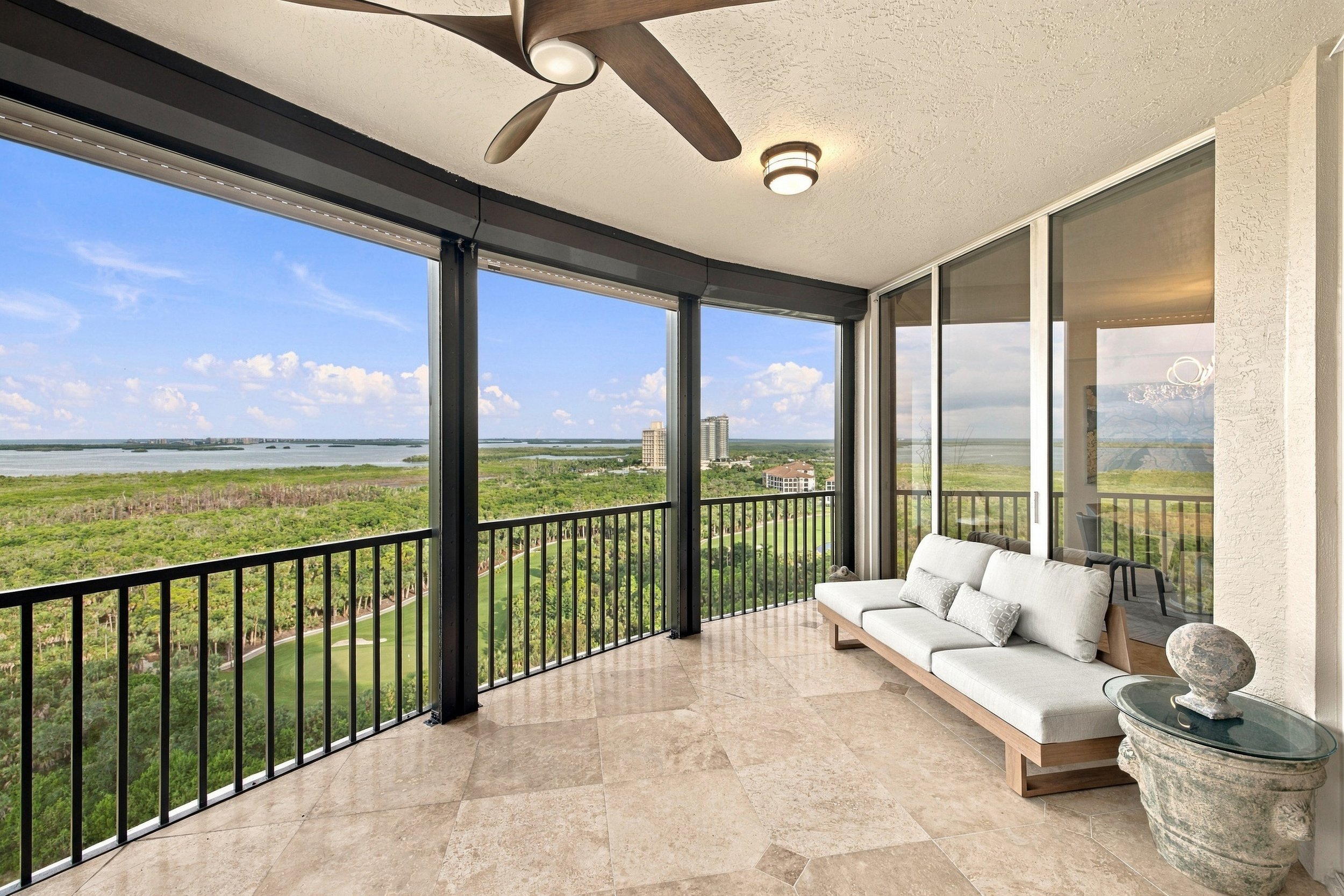 Wraparound balcony with seating overlooking treetops