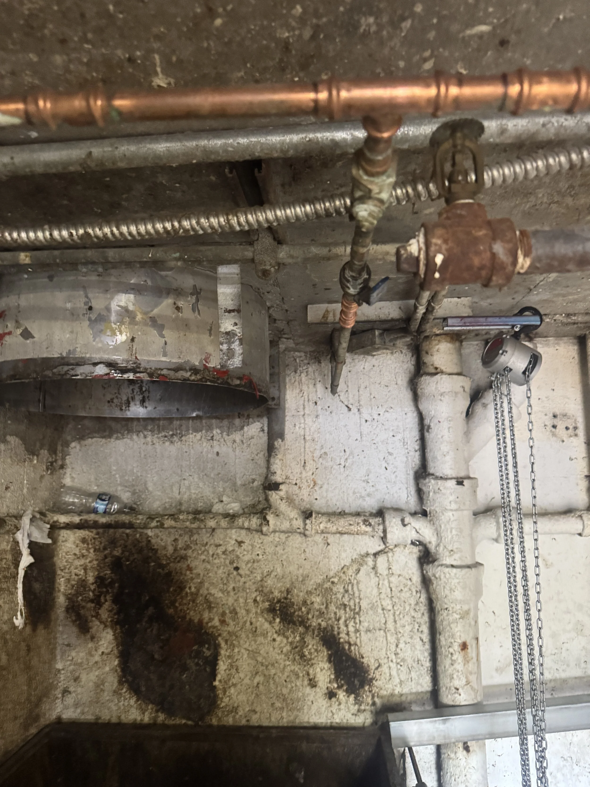 Before the fire damper was installed.