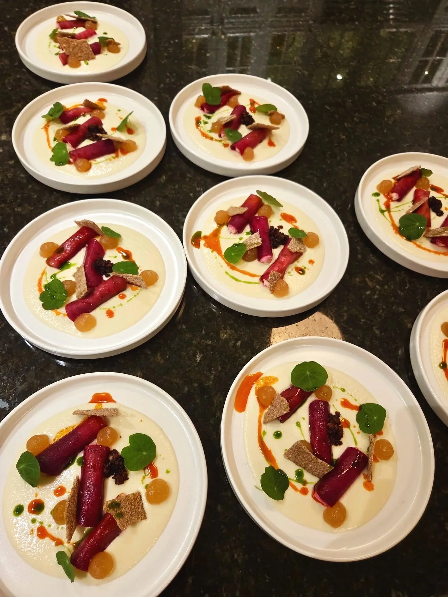 This one is going to surprise you. This is our 3rd course in our award-winning "Altitude Menu". Velvet 800 features wild beet root cannoli filled with a house orange-zest infused ricotta. Underneath you can find a celeriac puree that is also made in 