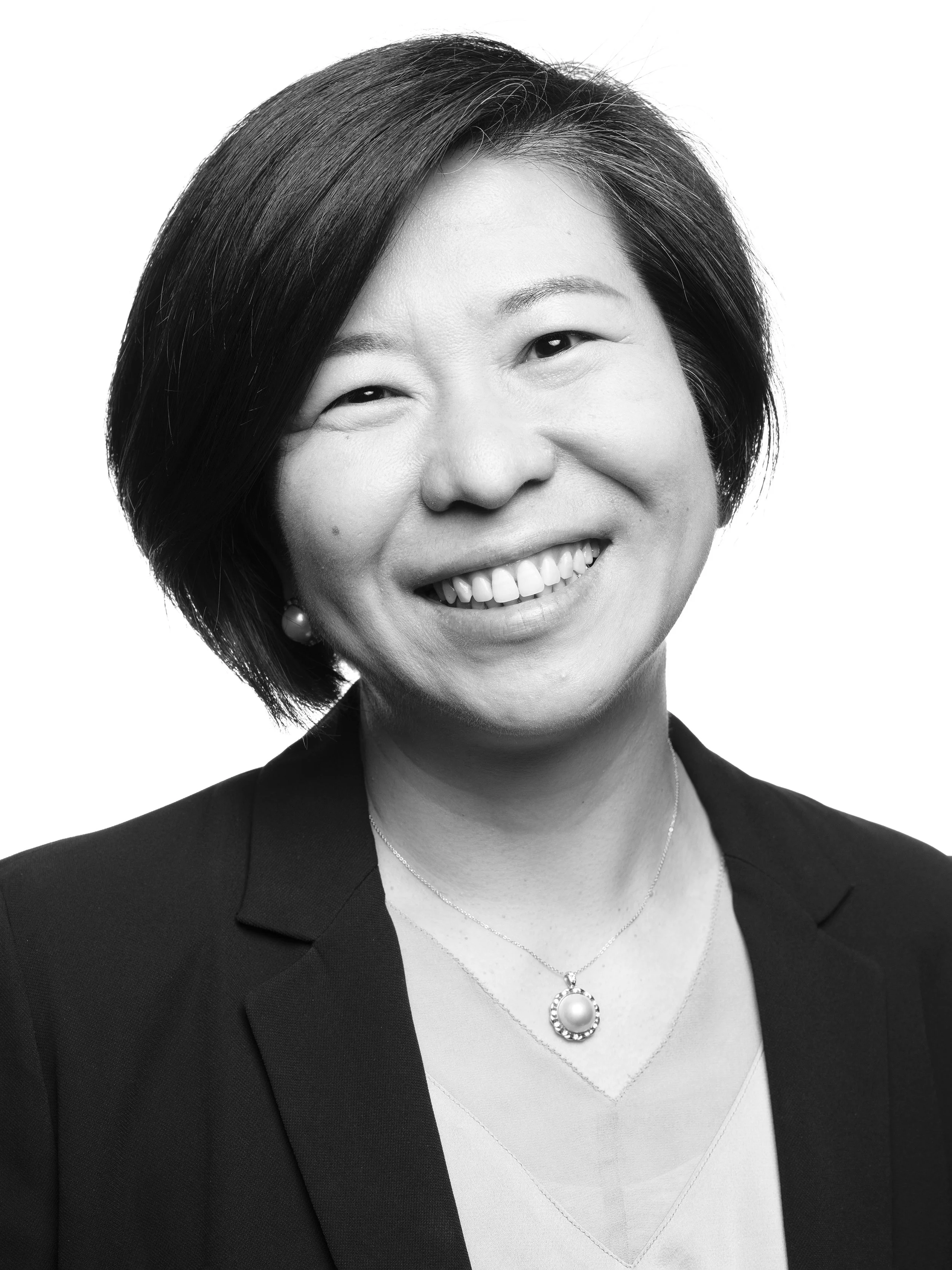 Smily Professional Headshot Portrait of an Asian woman done by Milos Gazdic Corporate Portraiture Photographer in Asia Pacific China Volvo Automotive Car