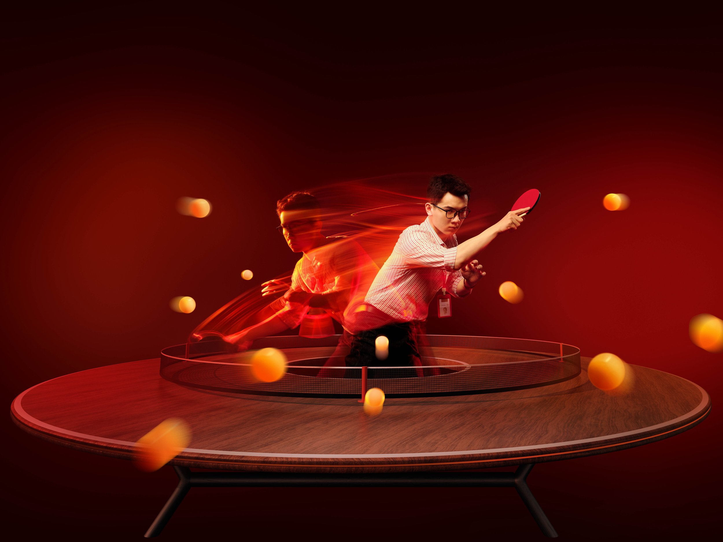 Trick sports shot of man playing ping pong table tennis with long exposure and light trails for the Red Bull Olympics campaign in Beijing by Milos Gazdic advertising photographer based in Shanghai China