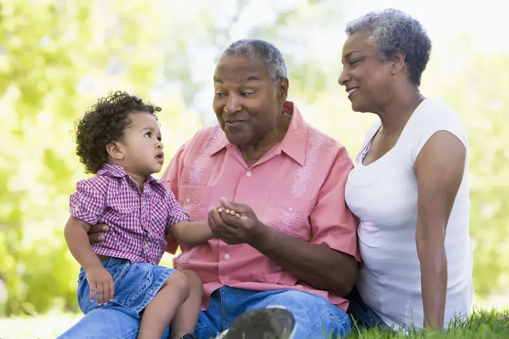 Elderly African American couple with grandchild