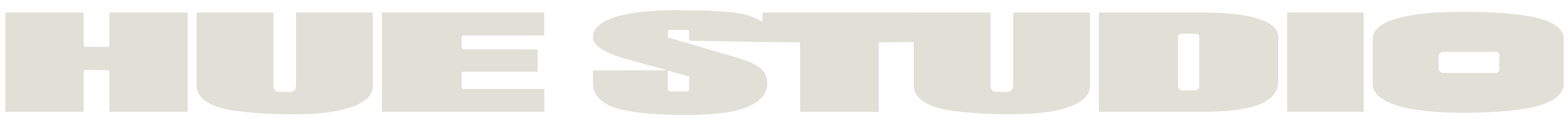 The word 'HUESTUDIO' in large gray block letters with a black background.