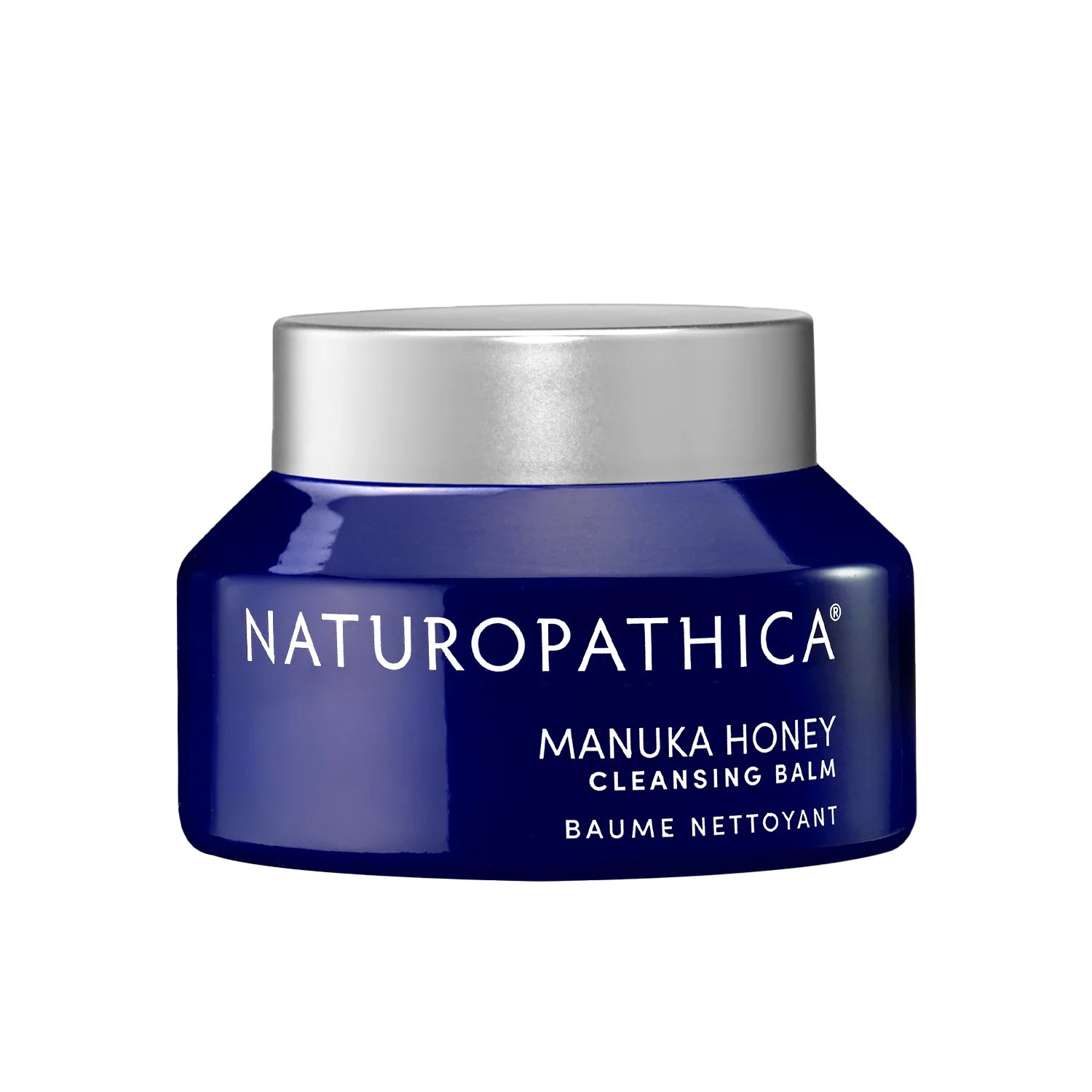 A jar of Nuropathica Manuka Honey Cleansing Balm on a black background.