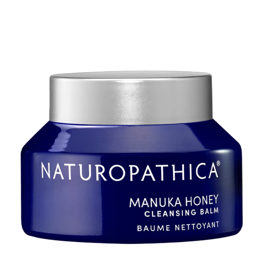 Blue jar of Naturopathica Manuka Honey Cleansing Balm with a silver lid.