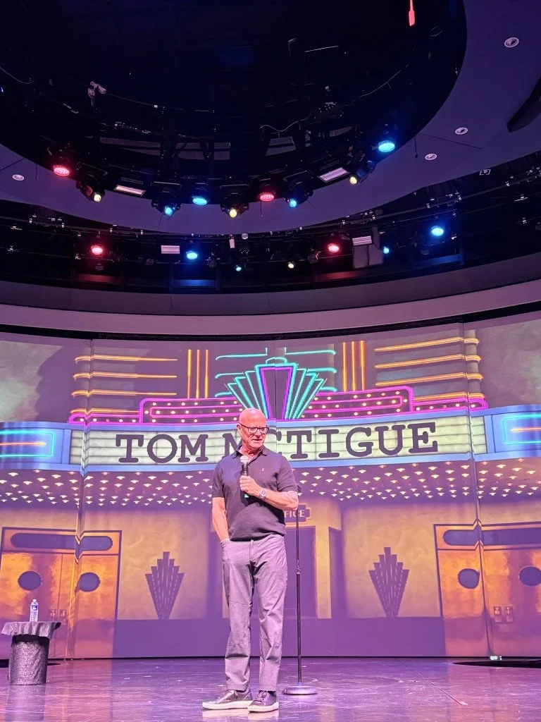 Tom McTigue performing comedy show on Day 3 aboard Celebrity Edge
