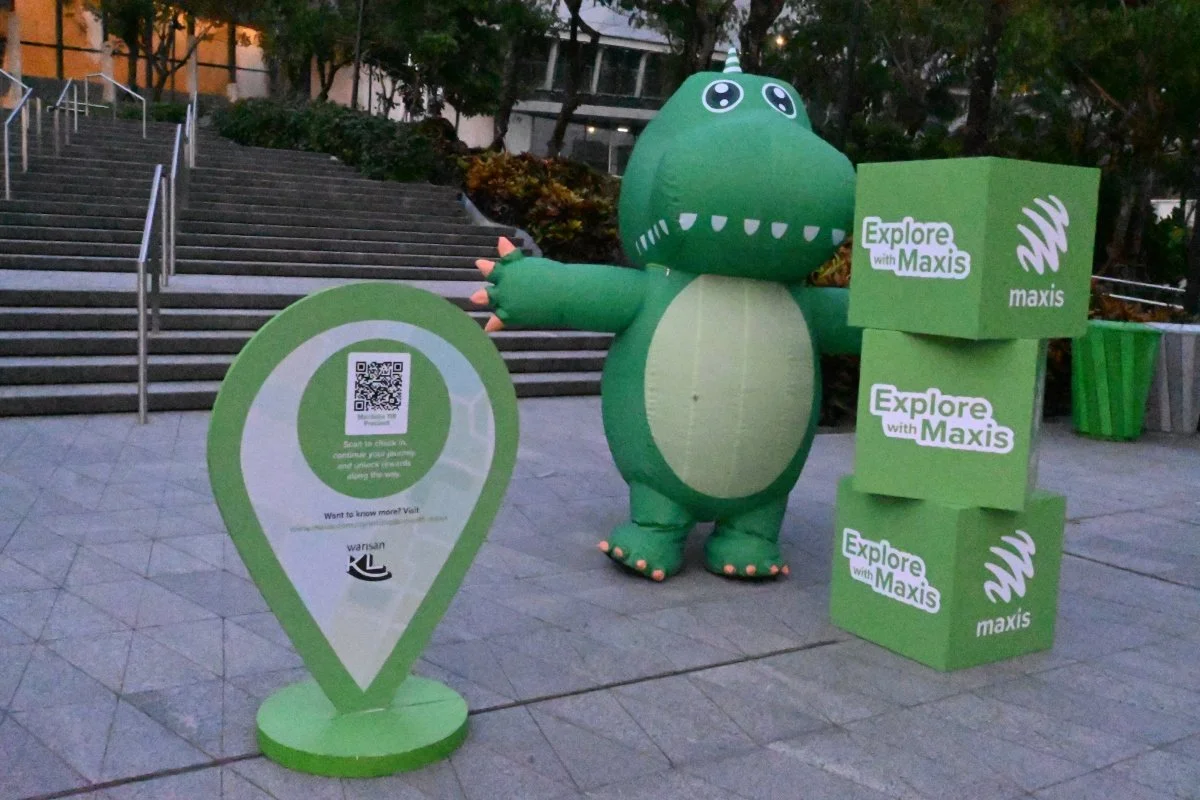 Dinosaur mascot and pit stop for photo