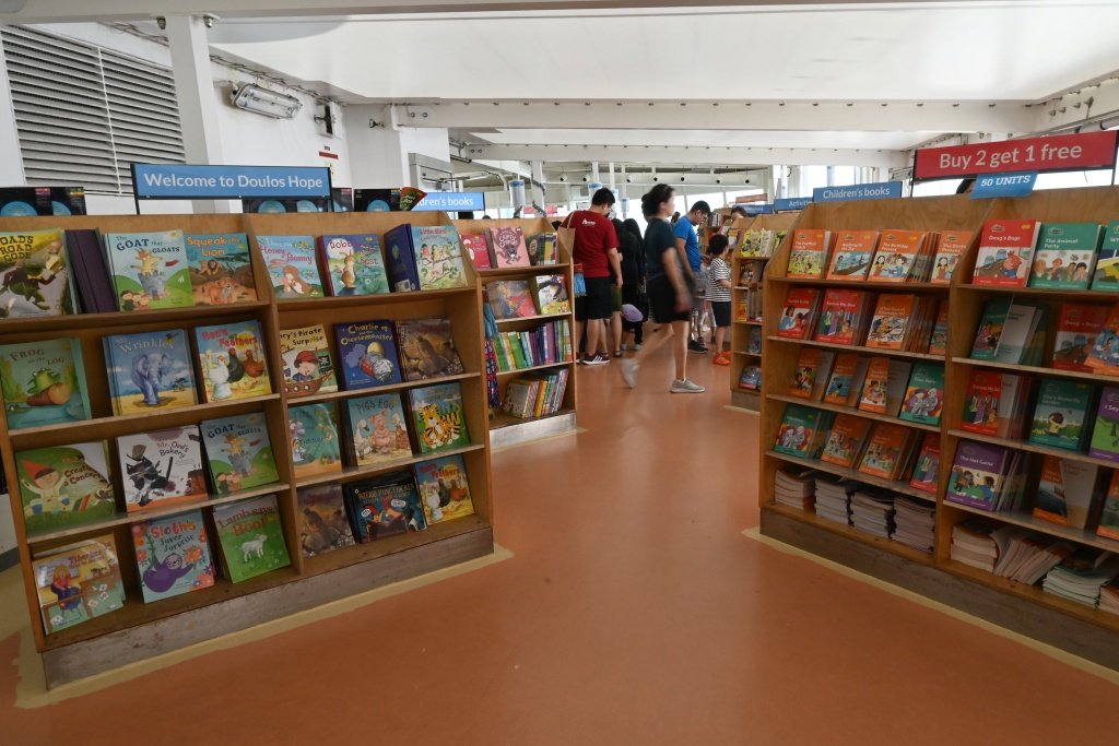 Doulos Hope book fair interior welcome sign children's books Port Klang