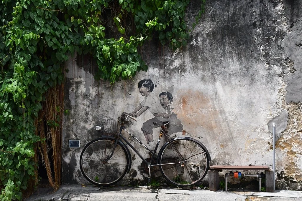 Children on a Bicycle mural by Ernest Zacharevic on Armenian Street, George Town Penang