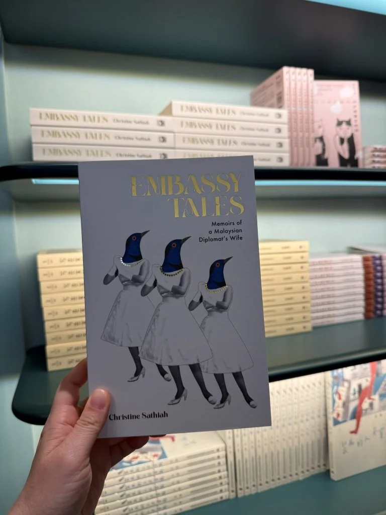 A copy of Embassy Tales: Memoirs of a Malaysian Diplomat's Wife by Christine Sathiah on display