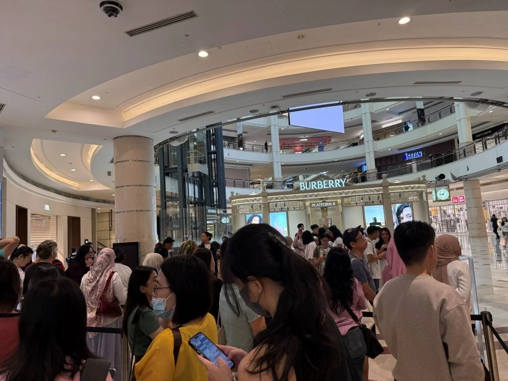 A long queue of visitors waiting outside Aesop KLCC before the Women's Library 2026 opens