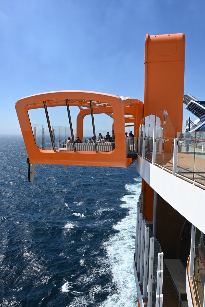 Celebrity Edge Magic Carpet cantilevered platform on the side of the ship