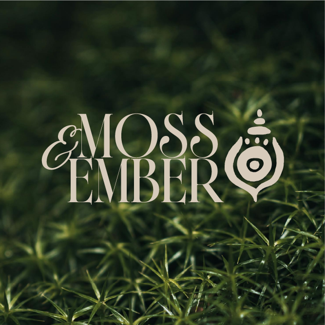 Moss & Ember wordmark and submark logo in cream overlaid on a close-up photograph of lush green moss
