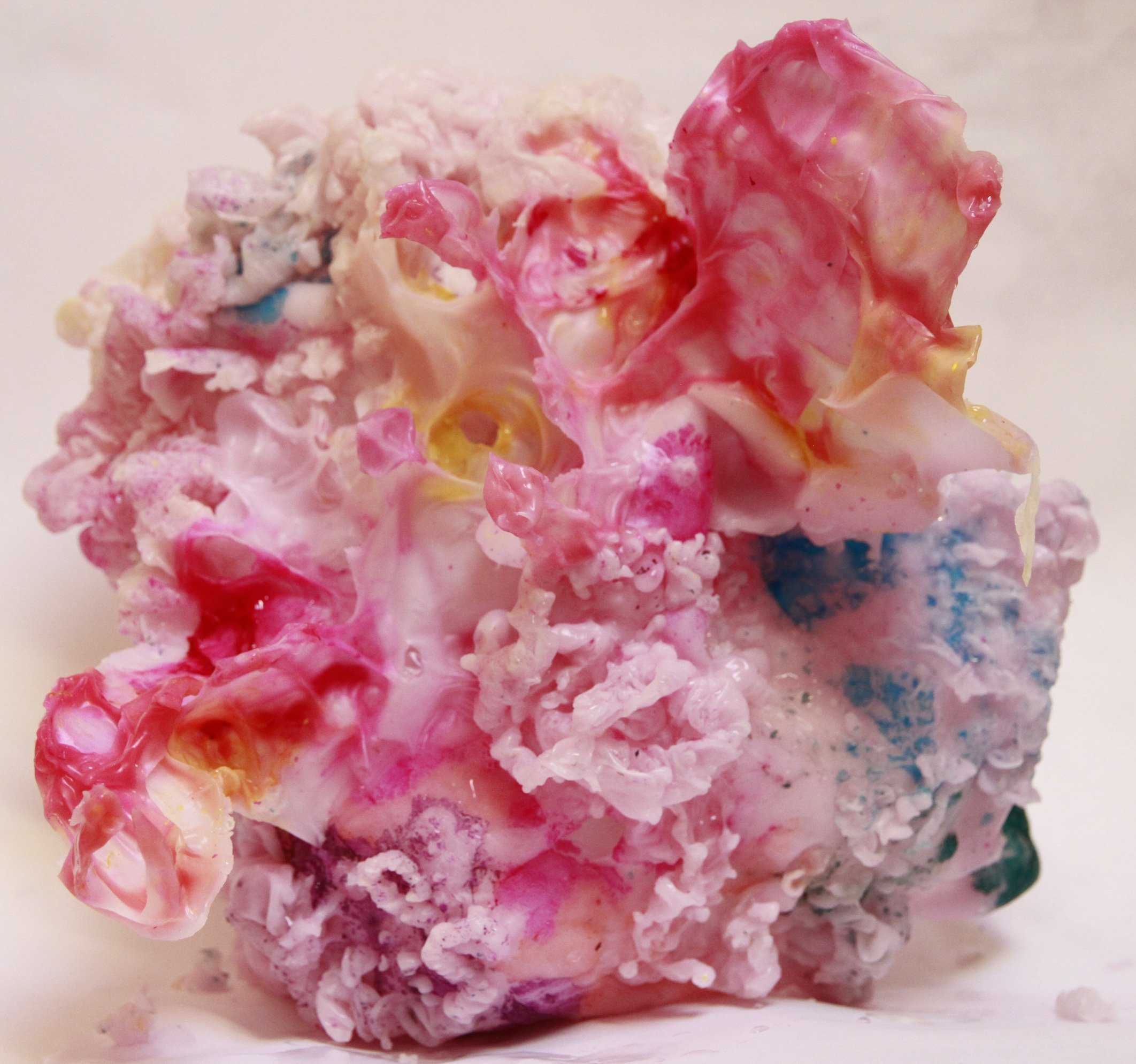 The Flesh | Sculpture | Hand-moulded wax and pigment form with fluid pink and coral folds. A tactile sculpture evoking bodily terrain, coral reefs, and dreamlike transformation through layered textures and colour.