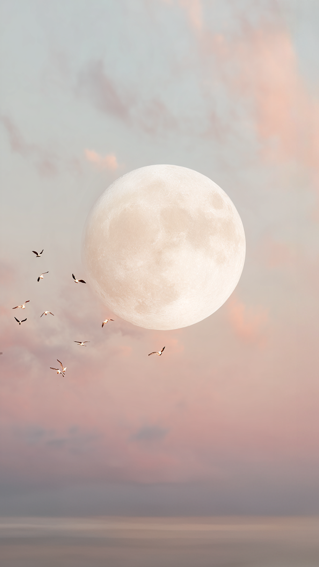 Full moon in a soft cloudy sky representing the creative process and natural cycles.