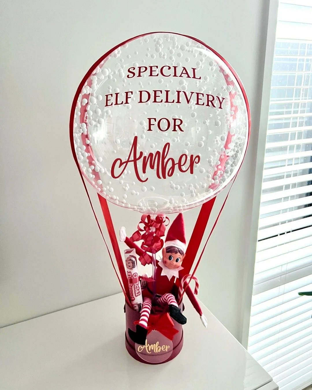 ✨🎄The Christmas Elf is back!🎄✨

Our Elf Arrival Balloons are the sweetest way to welcome your little festive friend &mdash; prices don&rsquo;t include the Elf! 🧝

A. Hot Air Balloon &ndash; $55
B. Festive Bubble &ndash; $59
C. Balloon Hamper &ndas