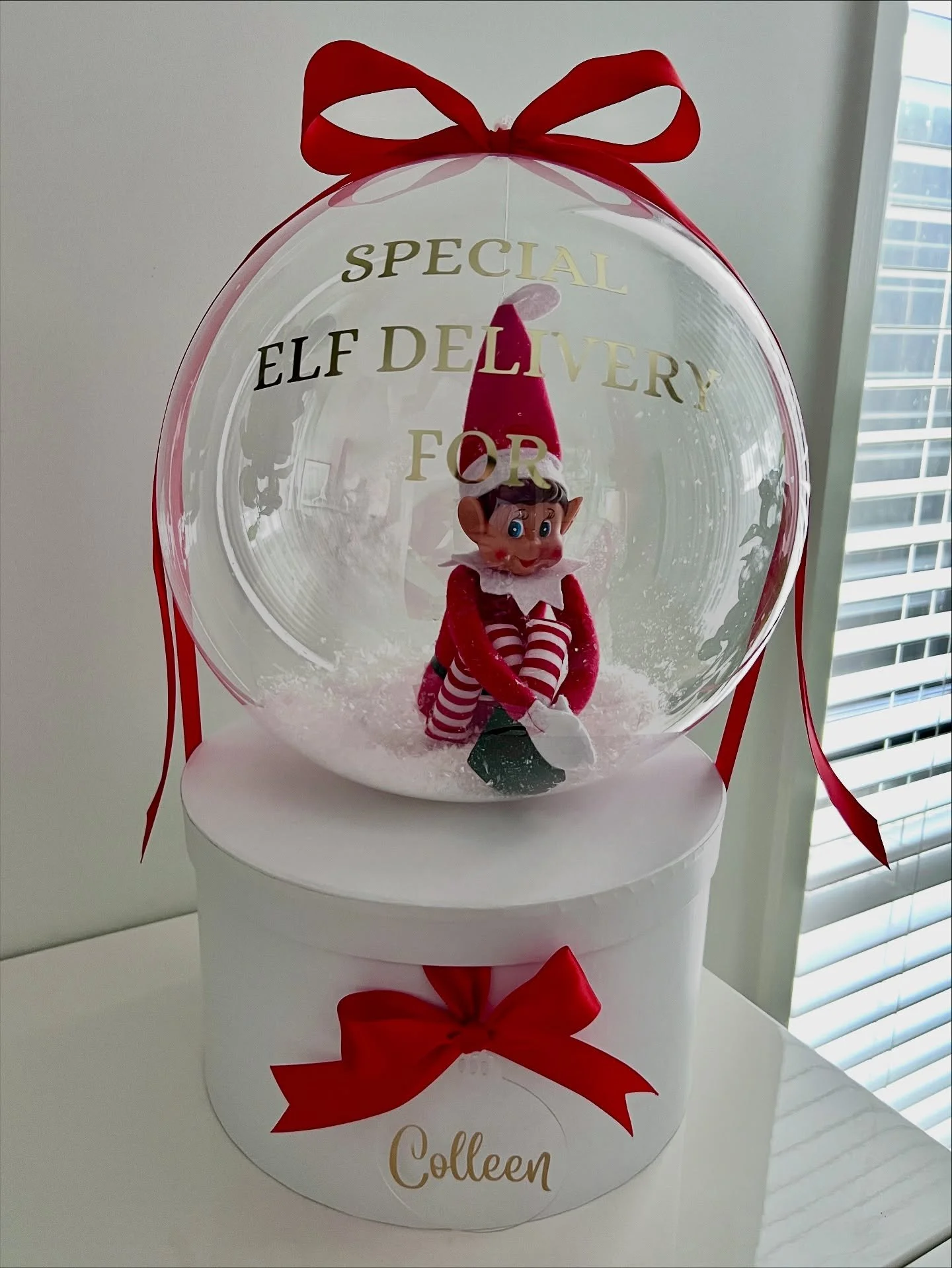 🎁✨ ELF SURPRISE BOX ✨🎁
A magical little box packed with festive fun!

Includes:
📜 Official Elf Report
🍭 Candy Cane Treat
🍫 Chocolate Coin
🎀 Personalised name on the balloon

Plus&hellip; you can hide your own gifts inside the box for an extra-c