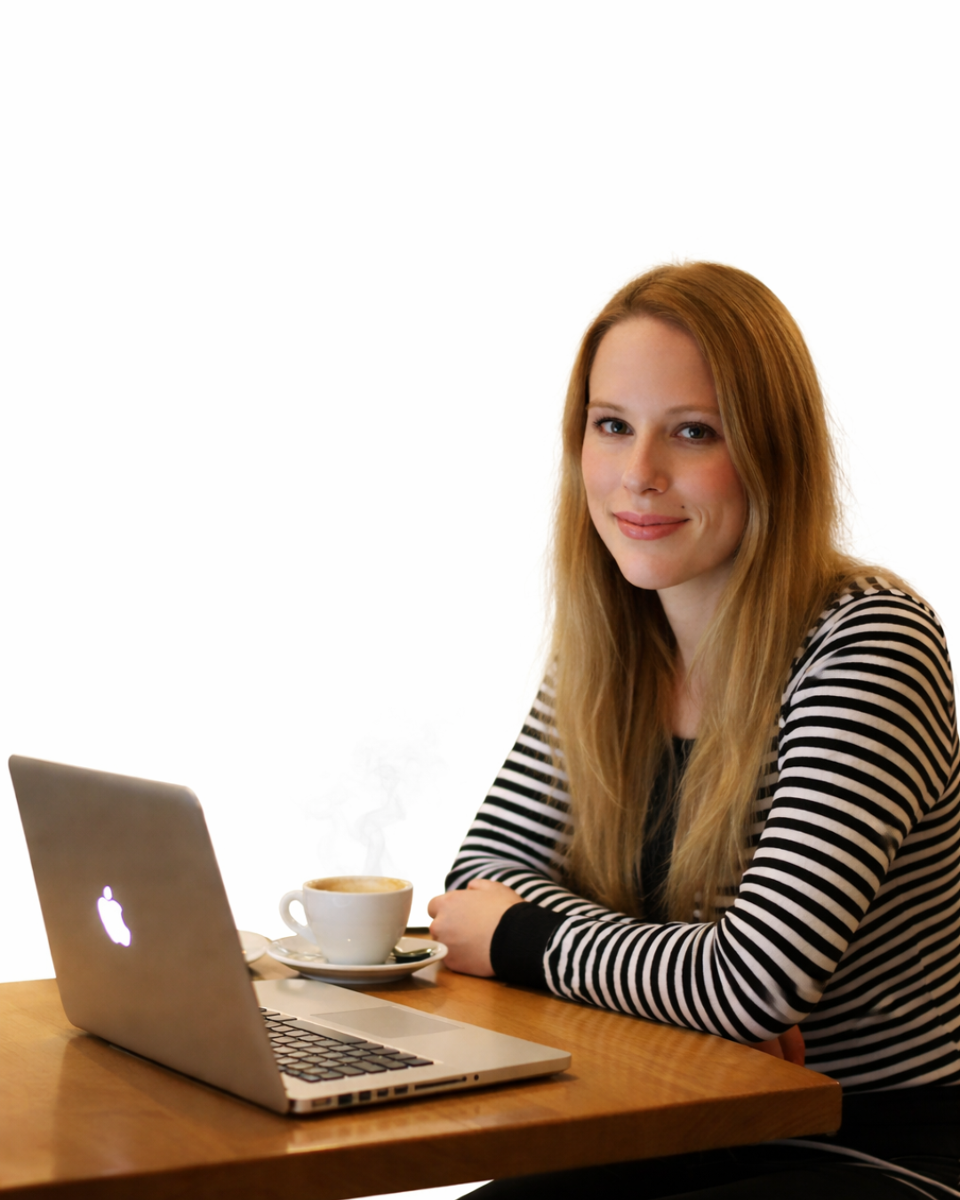 hannah oneill in a striped top sat at laptop with a coffee