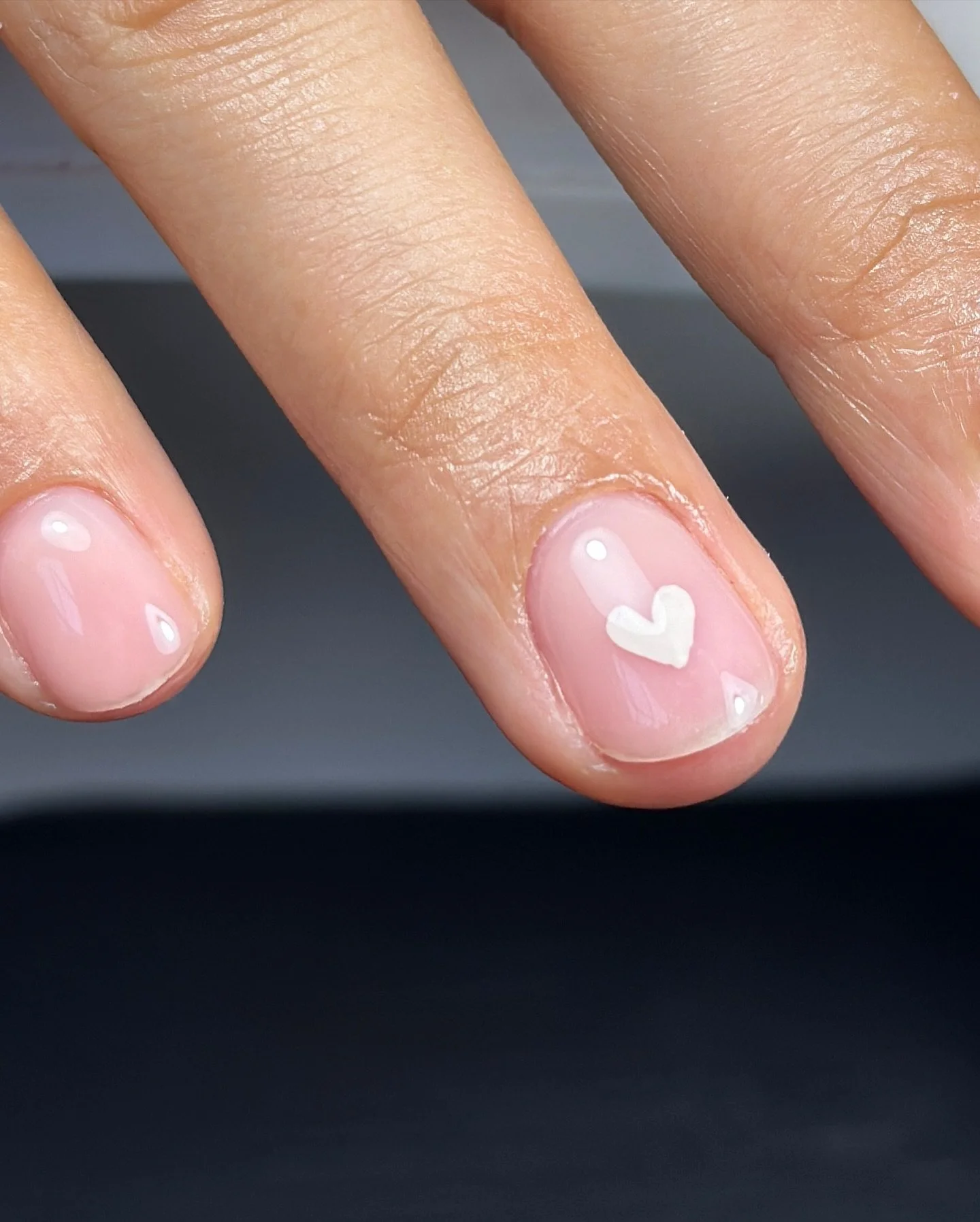 Clean girl vibes with the cutest little heart using @magpie_beauty Cr&egrave;me br&ucirc;l&eacute;e &amp; @the_gelbottle_inc almond nail art gel! 

Happy Valentine&rsquo;s Loves 🤍✨ 

#valentines #nailart #heartnails #valentinesday #cutenails #cleang