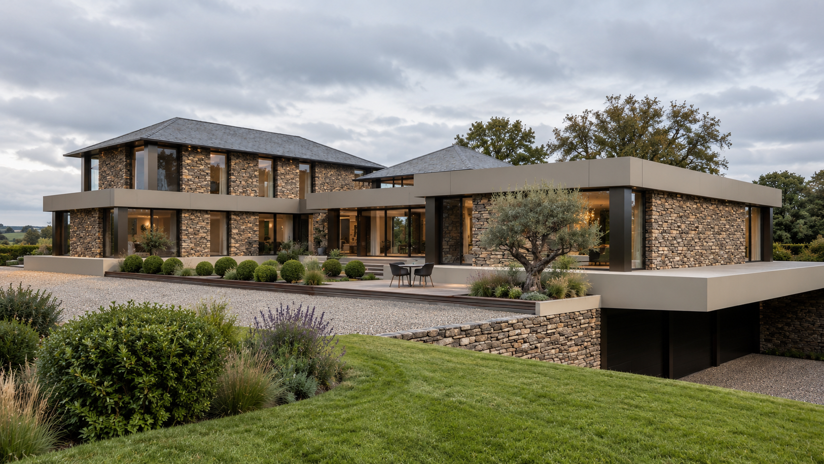 View of Bankfield, Poolfoot Lane, Singleton, Lancashire, showing the discreet sunken garage integrated beneath the landscaped grounds. The bespoke new-build country house, designed by Chartered Architect Joel Firth, uses natural stone, extensive glaz
