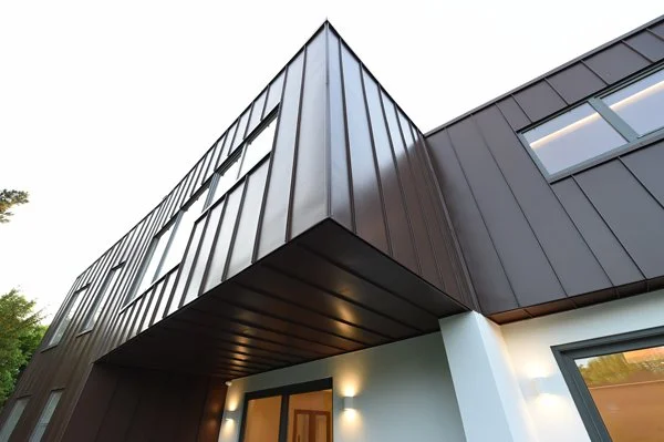 8 Church Drive, Lytham – Cantilevered Front Garden Terrace

Daytime architectural photograph showing the cantilevered upper floor extending over the front garden terrace, creating a sheltered outdoor space beneath the contemporary façade.