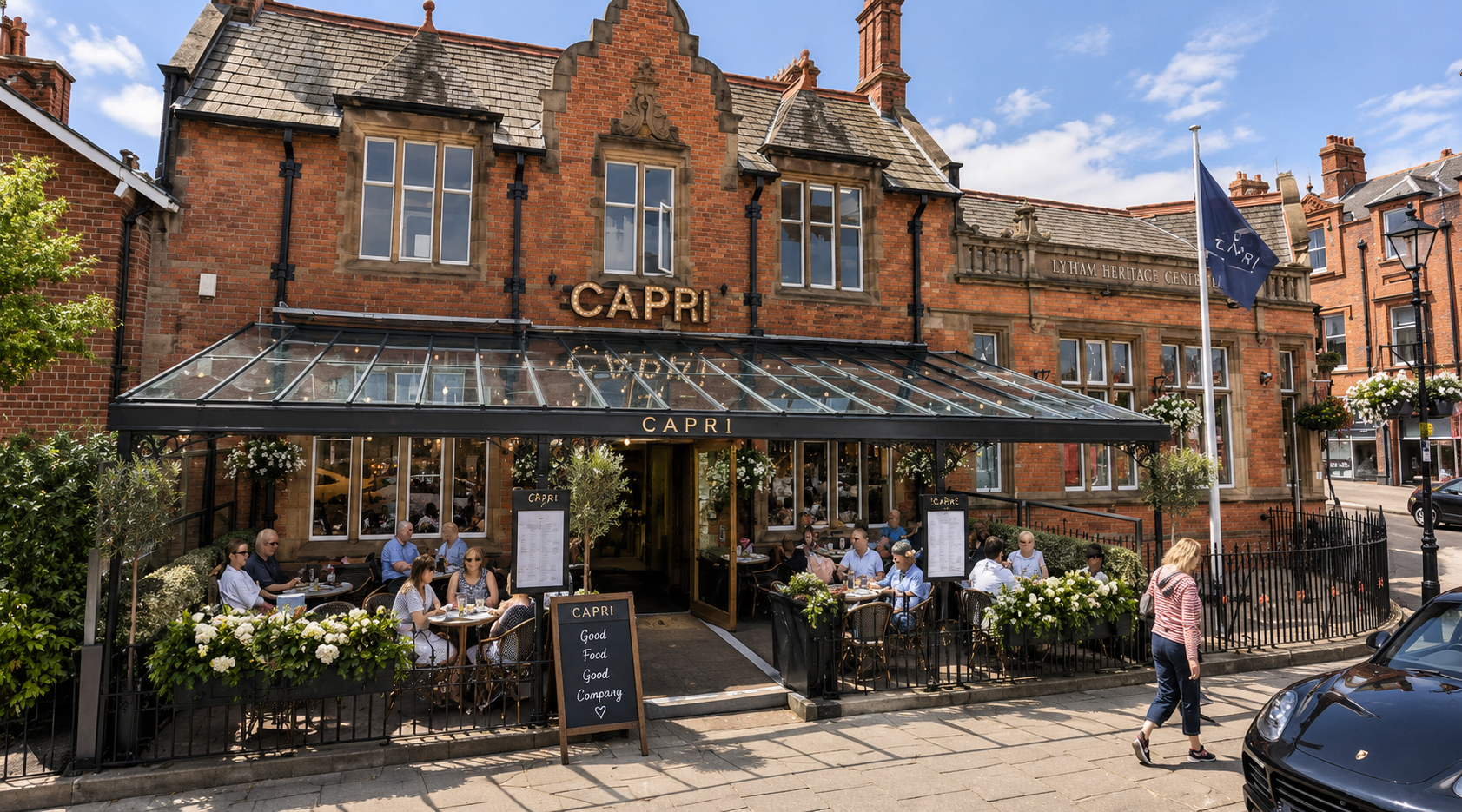 Capri Wine Bar, Lytham St Annes — Exterior Refurbishment and Design — refurbishment and interior design of a prominent historic red-brick building in central Lytham, creating a distinctive contemporary wine bar. The scheme incorporates a glazed entra