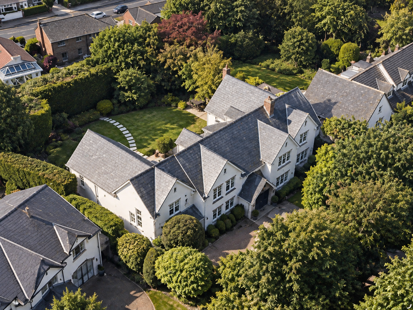 Meadowlands, Islay Road, Lytham, Lancashire — aerial view of a substantial luxury residence featuring traditional gabled architecture, extensive private gardens, mature trees and landscaped grounds.