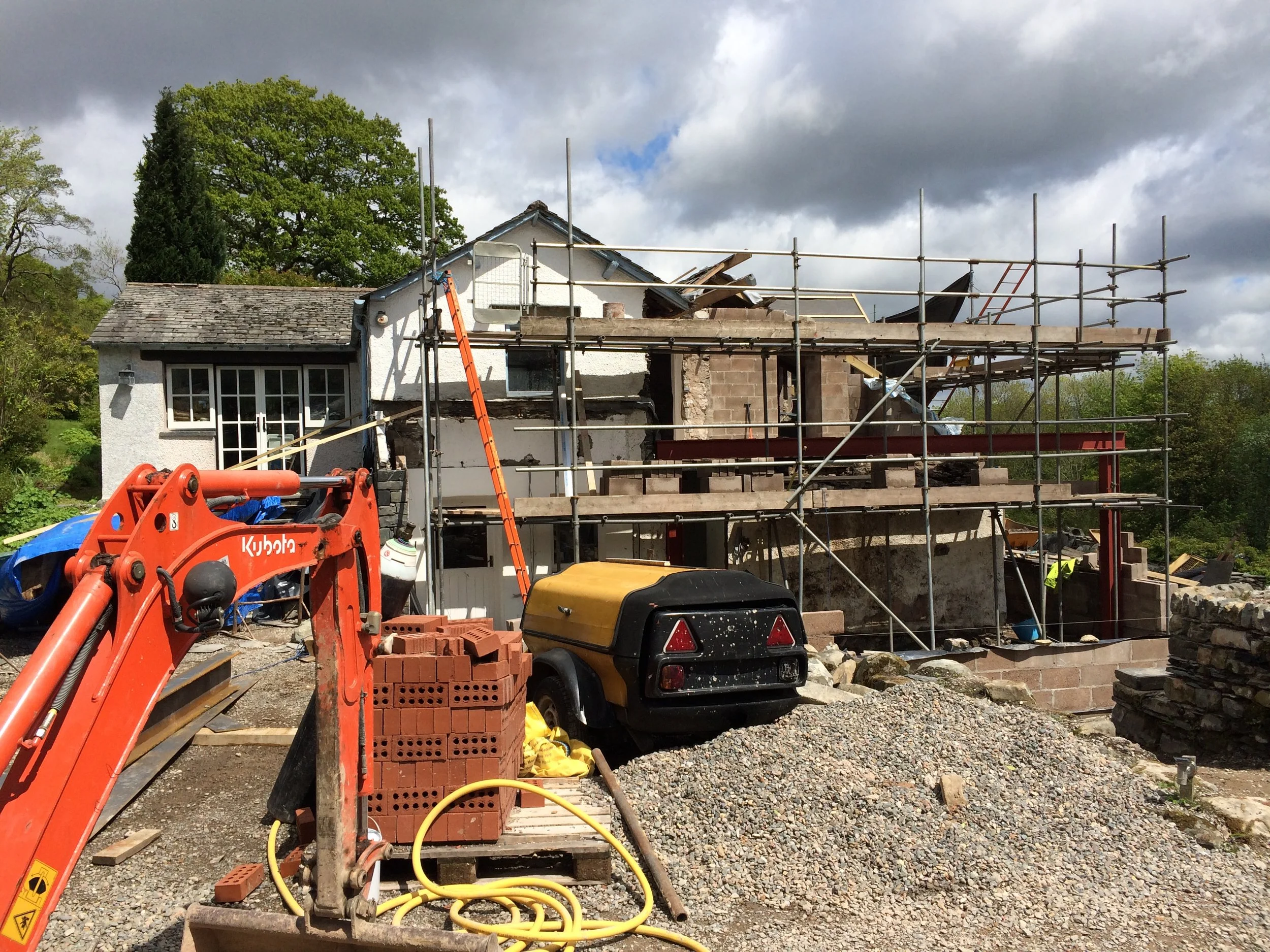 Coniston farmhouse during construction, showing the extensive structural alterations and redevelopment.