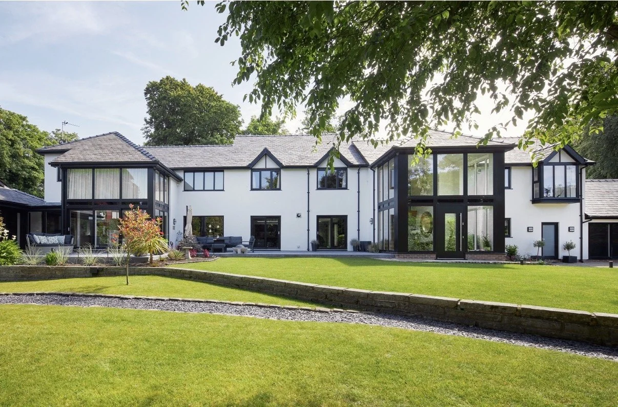 7 Church Drive, Lytham — extensive house remodelling and extension featuring contemporary glazed elevations, redesigned living spaces and landscaped gardens.