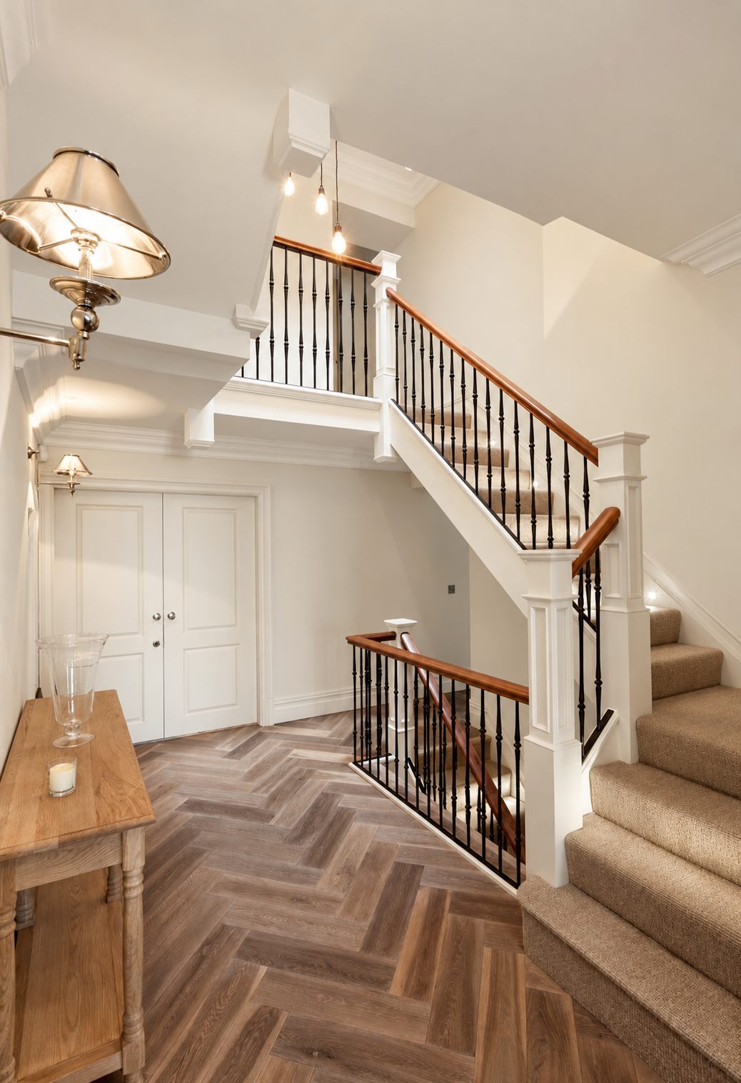 Windmill House, East Beach, Lytham St Annes, Lancashire — elegant entrance hall and staircase interior designed by Chartered Architect Joel Firth as part of a major residential renovation and extension. The design combines traditional timber handrail