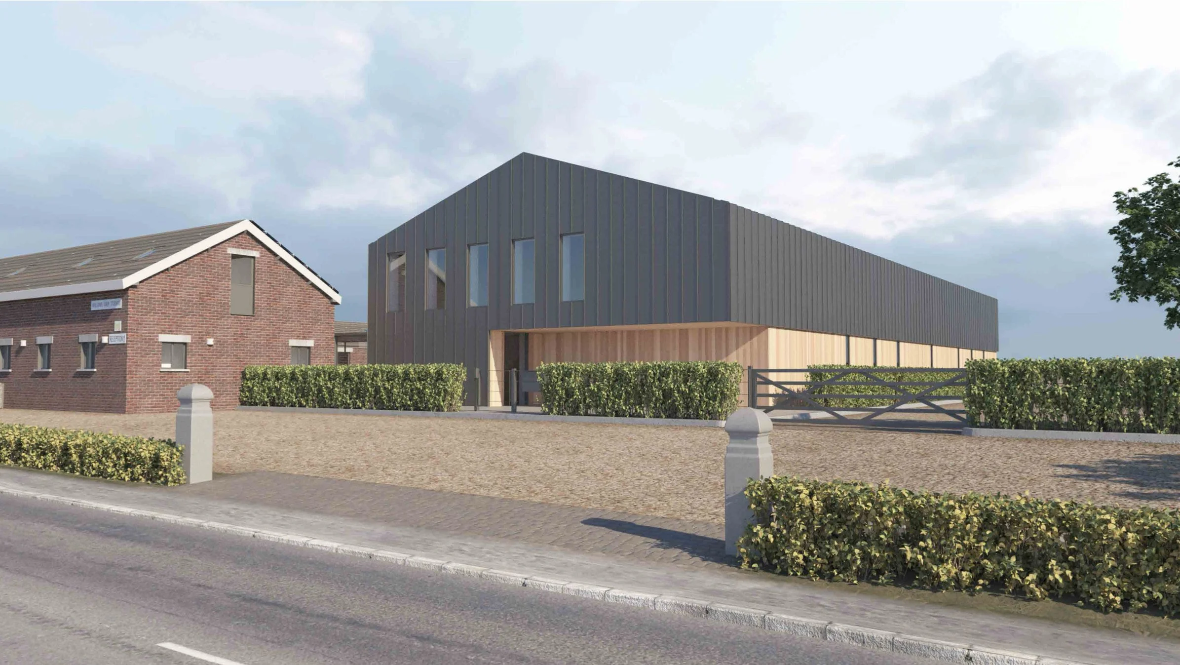 Ballam Road, Lytham St Annes, Lancashire — contemporary office and studio development featuring distinctive dark cladding, simple pitched roof forms and carefully integrated glazing. The design combines flexible commercial workspace with modern archi