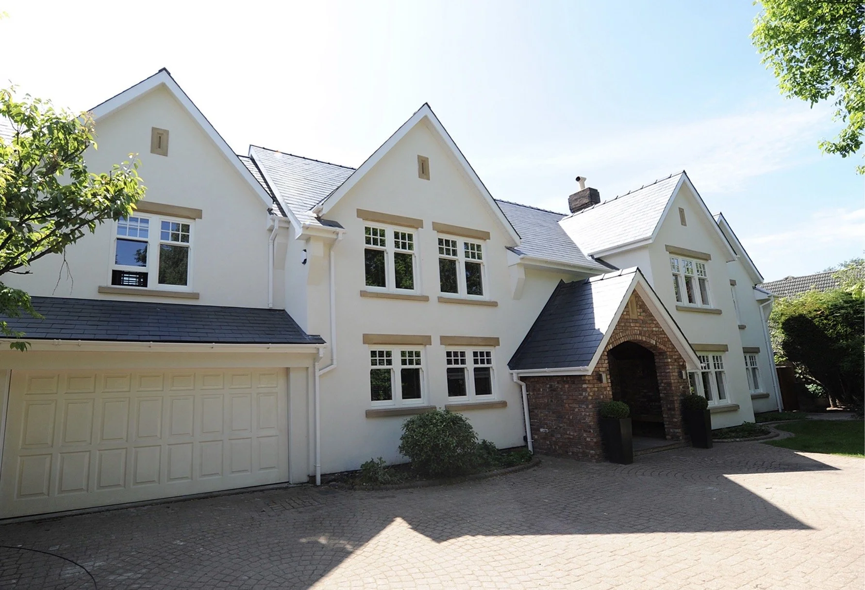 Meadowlands, Islay Road, Lytham, Lancashire — luxury detached residence featuring traditional architectural design, distinctive gabled elevations, stone entrance porch, integrated garage and spacious private driveway.