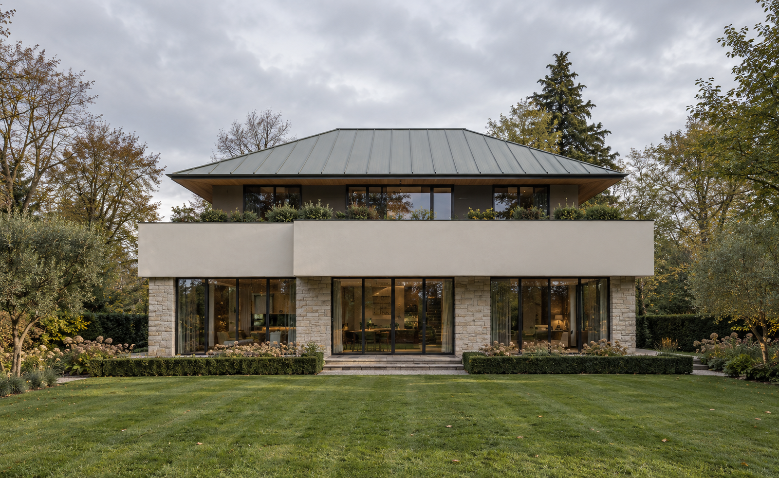 Islay Road, Lytham St Annes, Lancashire — new-build low-energy home by architect Joel Firth, featuring minimalist contemporary architecture, deep overhangs and extensive glazing within a mature landscaped setting.