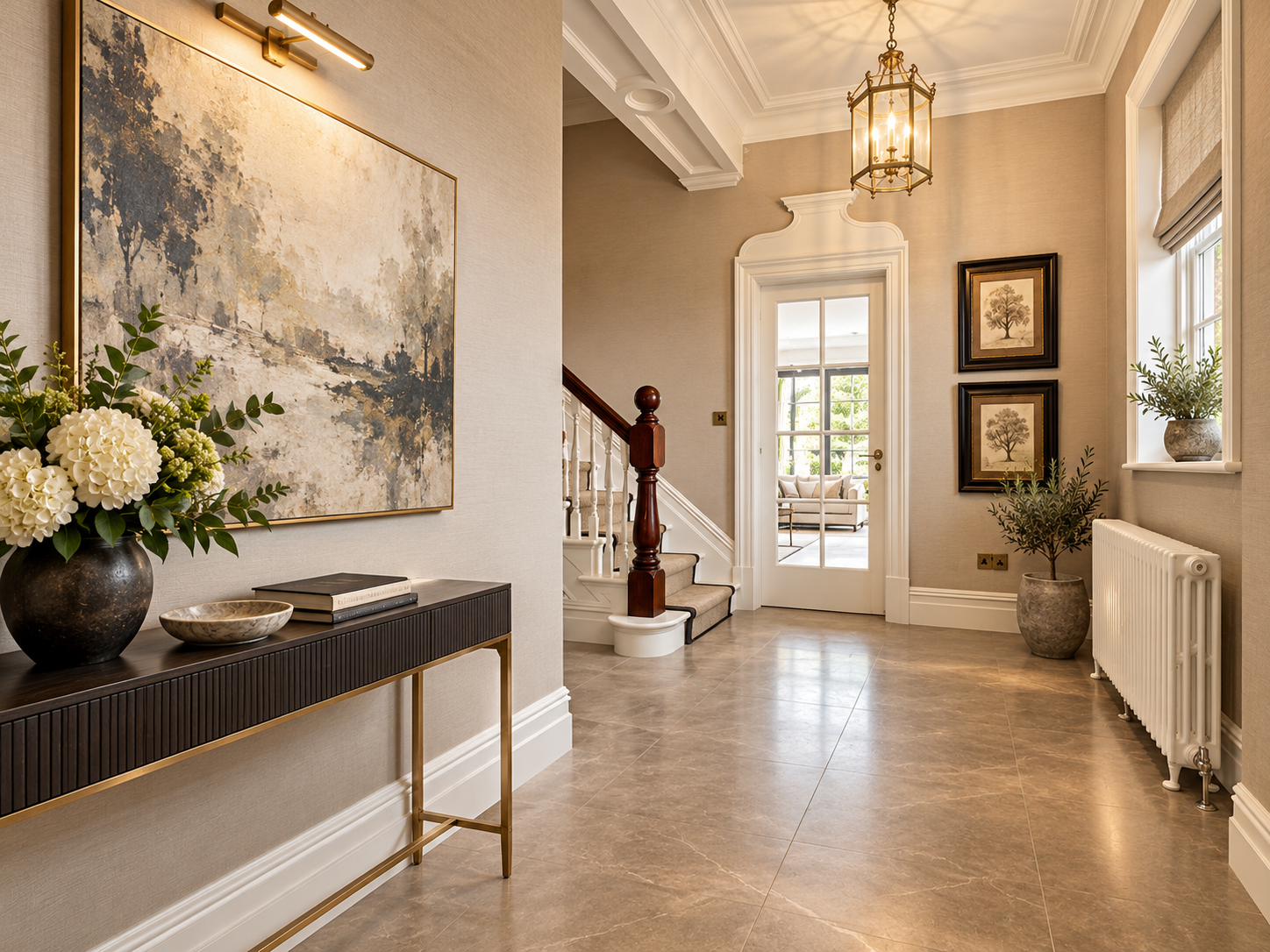 Entrance Hall — Refined entrance hallway featuring a traditional staircase, decorative lighting and contemporary interior finishes.