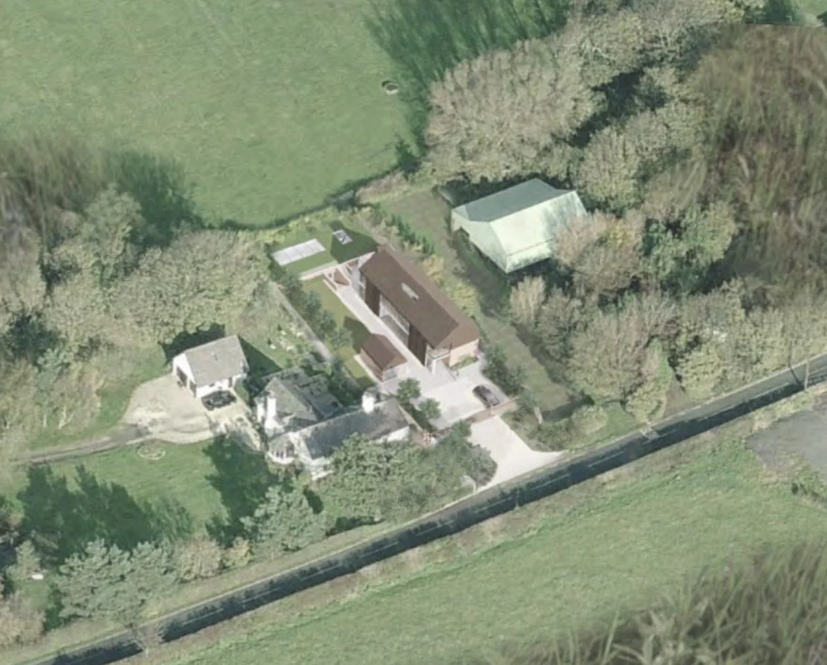 Fir Tree Barn, Ballam Road, Lytham St Annes — Aerial Site Montage — aerial visualisation illustrating the proposed contemporary barn-style replacement dwelling within its rural setting. The planning-approved design incorporates a highly insulated, en