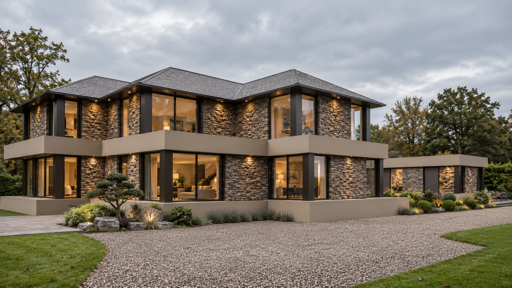 Entrance elevation of Bankfield, Poolfoot Lane, Singleton, Lancashire, a bespoke new-build country house designed by Chartered Architect Joel Firth. Natural stone, extensive glazing and deep horizontal rooflines define the contemporary architecture, 