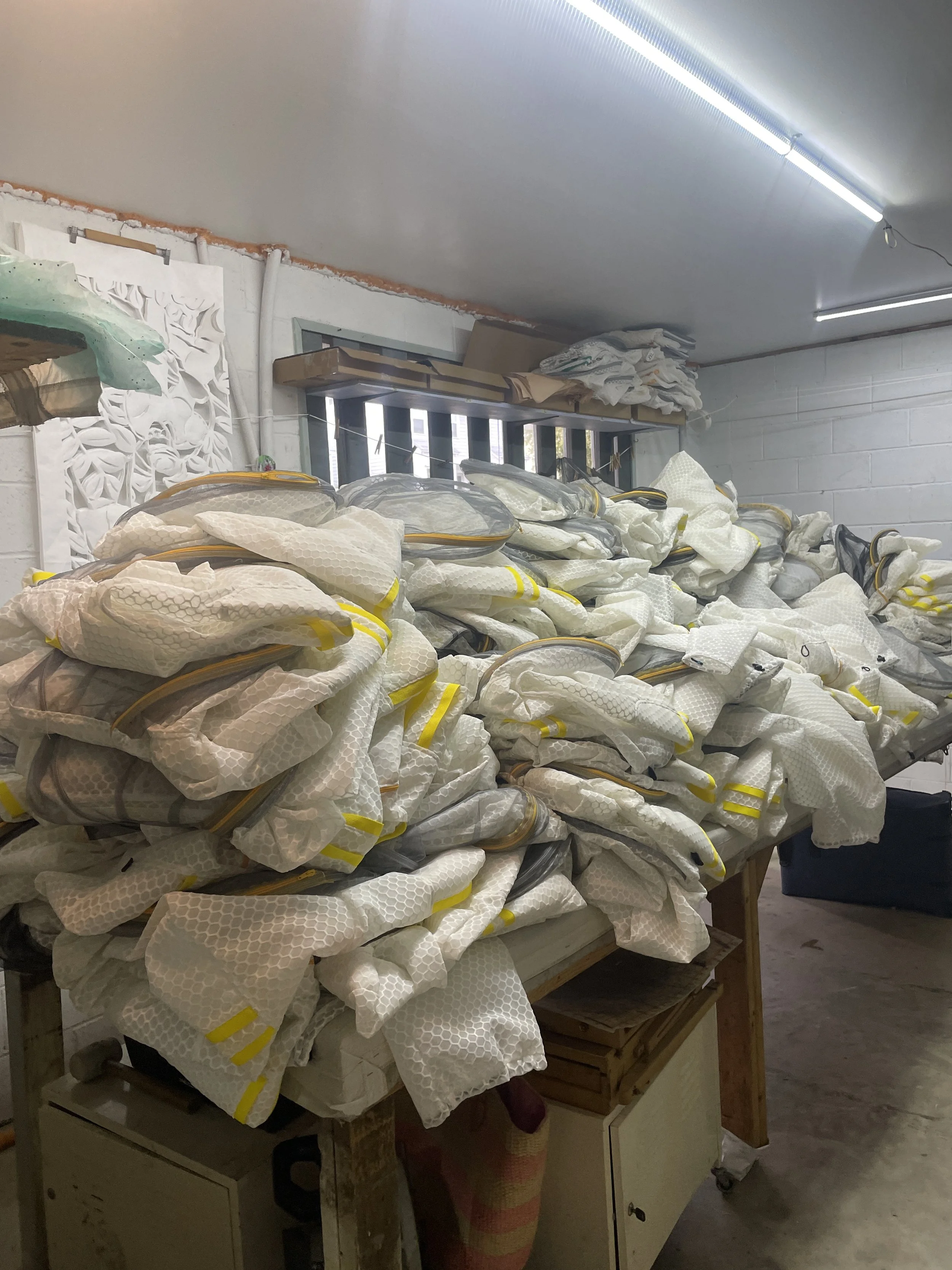 Batch of 200 finished Jeometry Sunny Suits ready for distribution