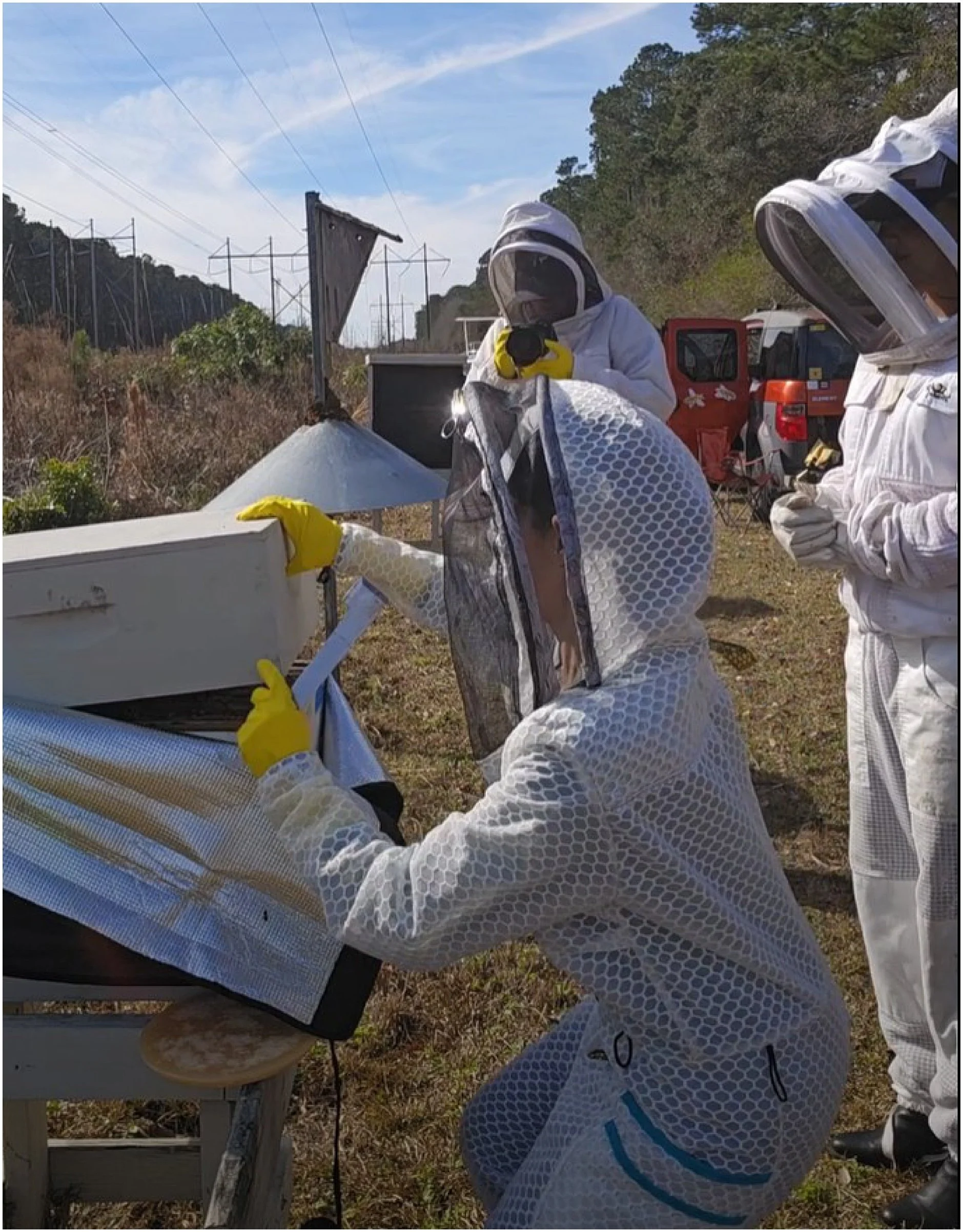 Charleston female beekeeper in her suit from Jeomerty Beewear