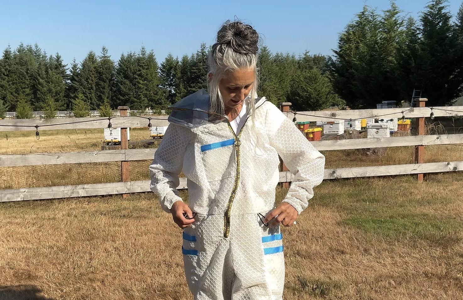 Tamila Morgan, co-owner of The Beekeeper's Academy, in her Jeometry suit.