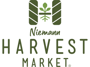 Logo for Niemann Harvest Market featuring stylized plant and leaf design with text.