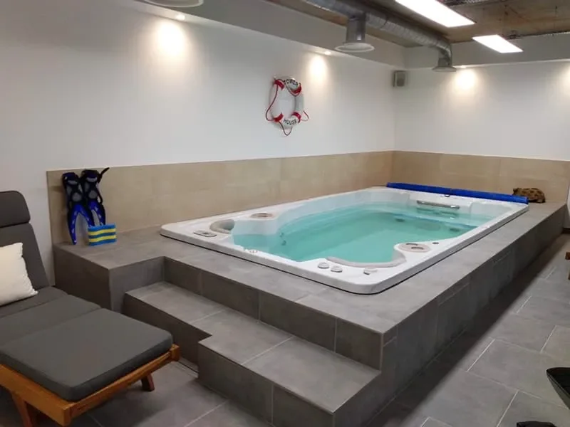 Classic-Car-Showroom-with-Living-and-Recreational-Accommodation-Essex-UK-Jacuzzi-Bath.webp