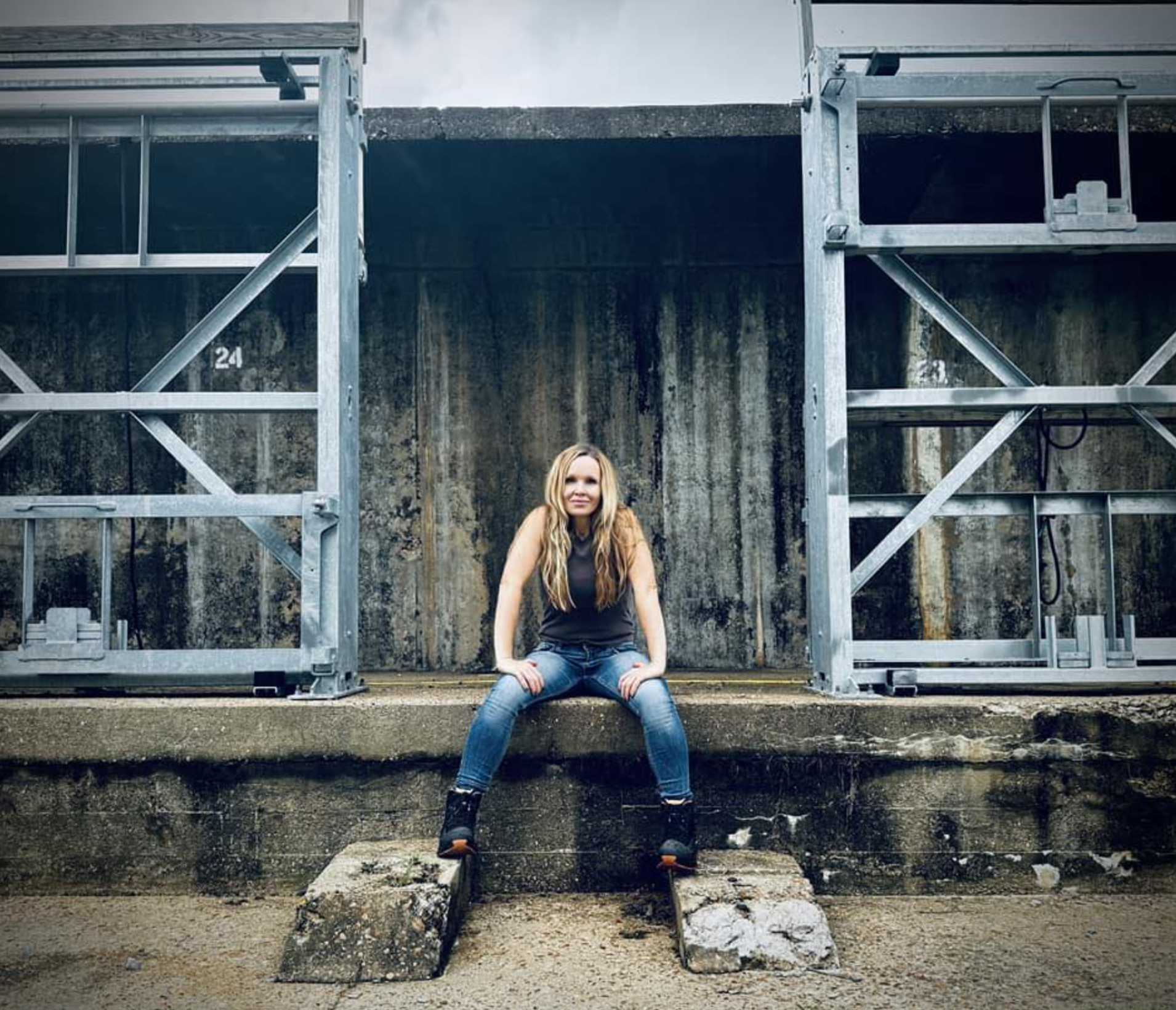 Historian Erin Faith Allen at Camp Gruber, Oklahoma, training ground of the 42nd Rainbow Infantry Division, WWII.